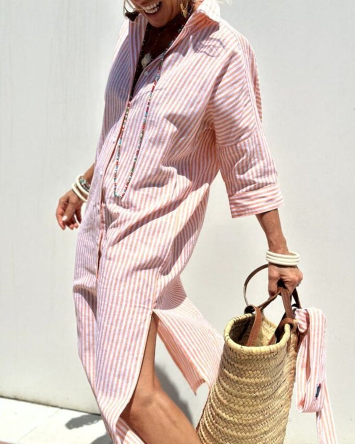 Coral striped button-front shirt dress worn open with woven tote