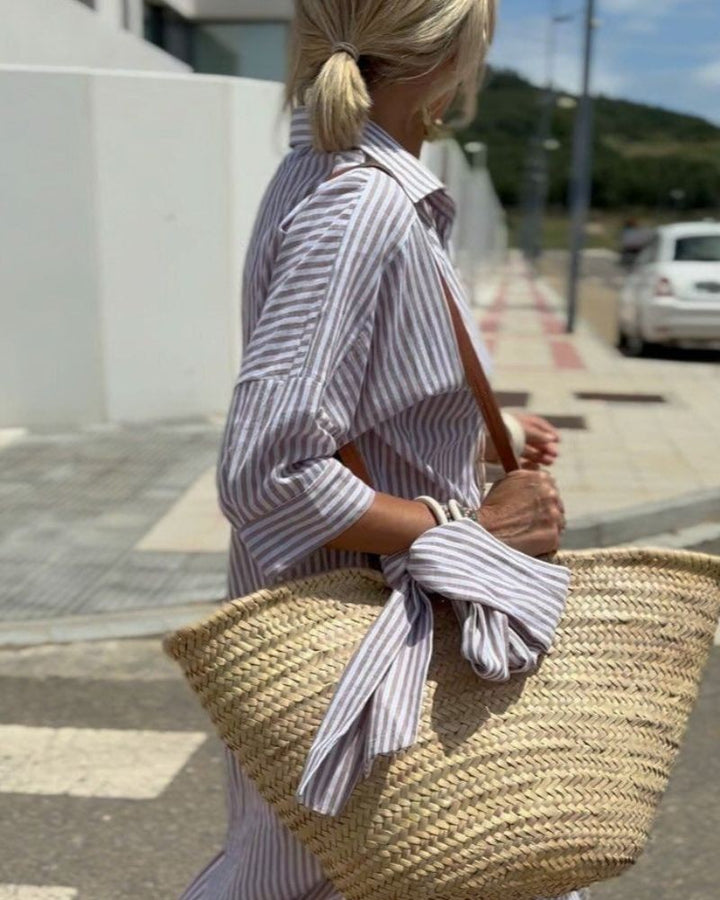 Grey striped shirt dress detail with woven basket bag and crossbody strap