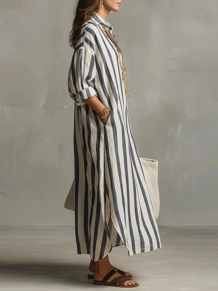 Side view of navy striped maxi shirt dress with relaxed oversized fit