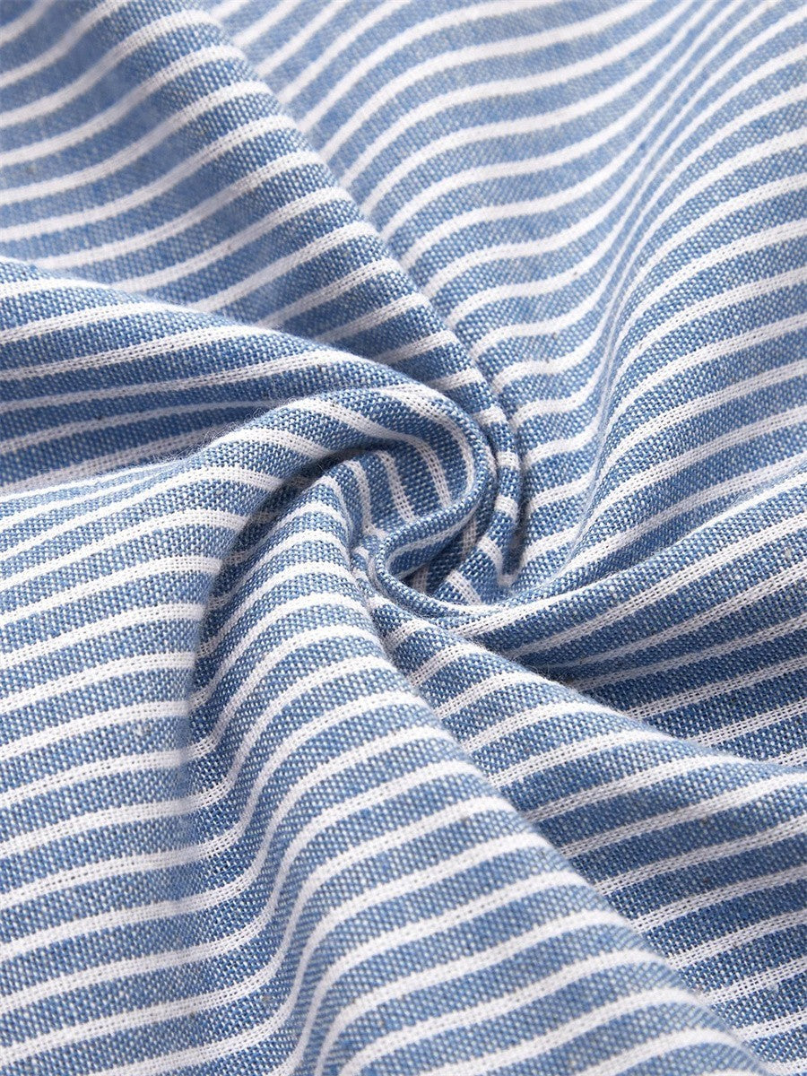 Close-up of woven blue and white striped cotton fabric texture