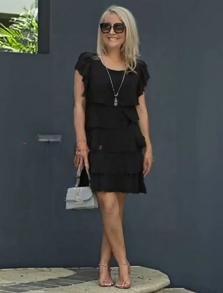 Black ruffle-layered mini dress with flutter cap sleeves