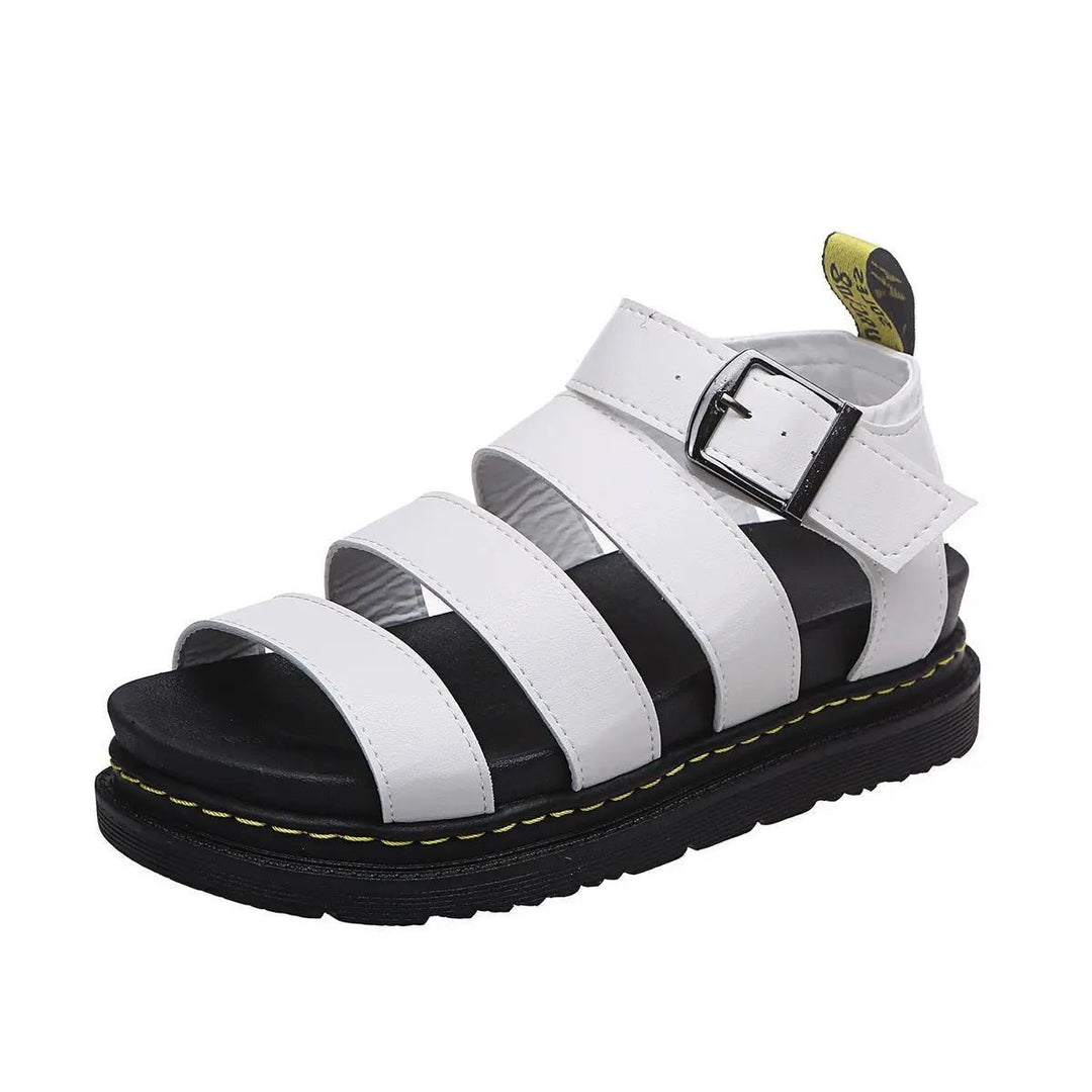 White triple-strap platform sandal shown from an angled front view