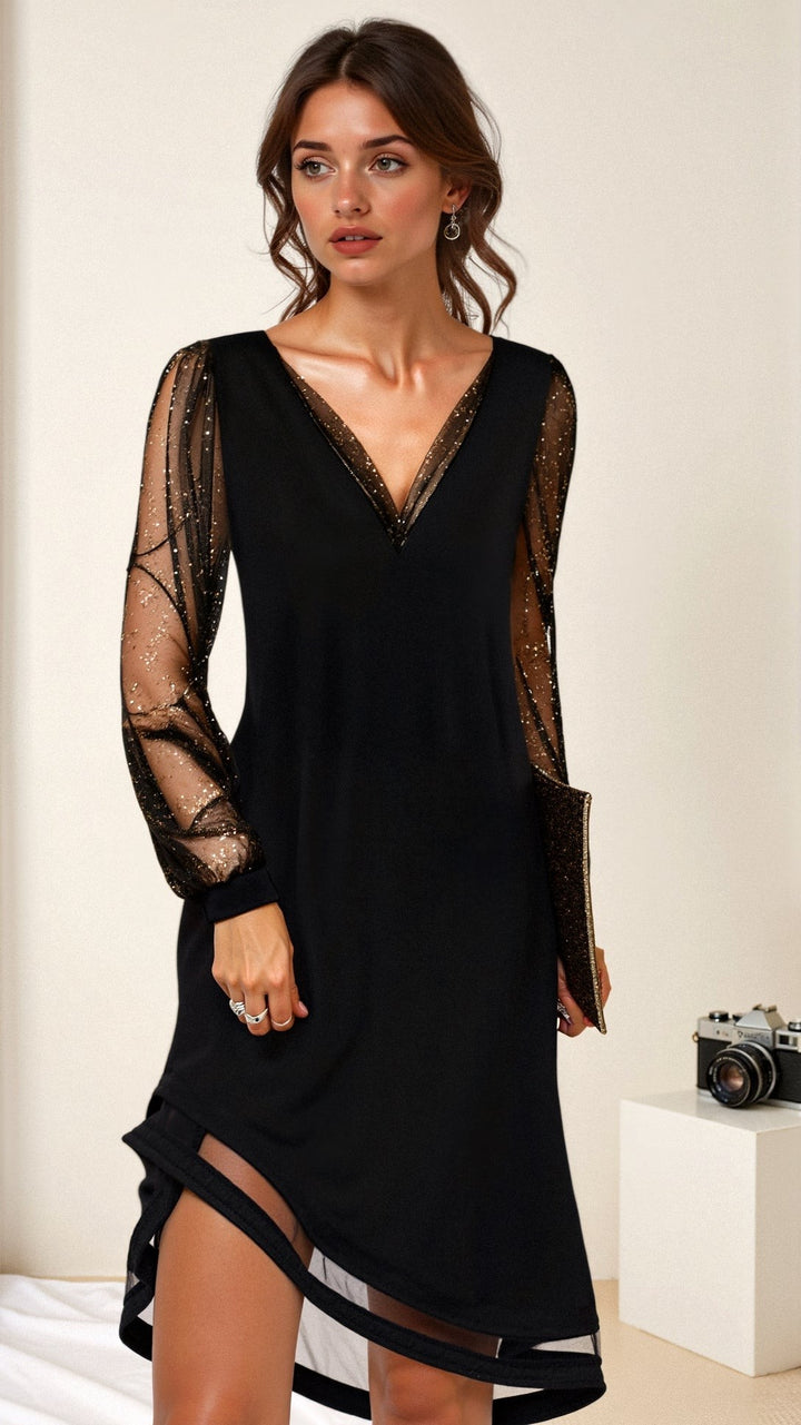 Black evening dress with sheer gold glitter sleeves and asymmetric mesh hem
