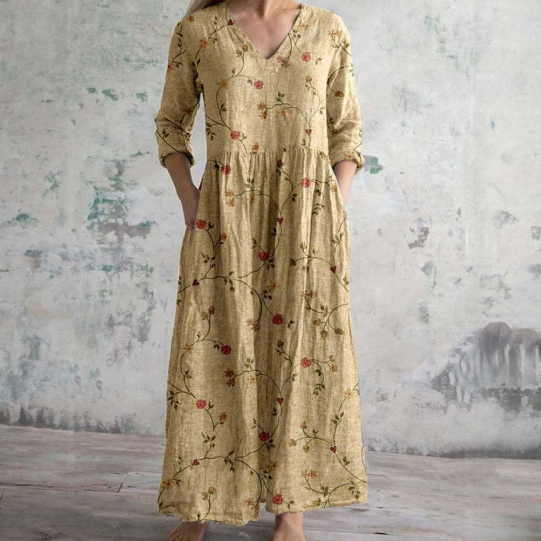 Beige floral maxi dress with V-neck and three-quarter sleeves, rose vine print