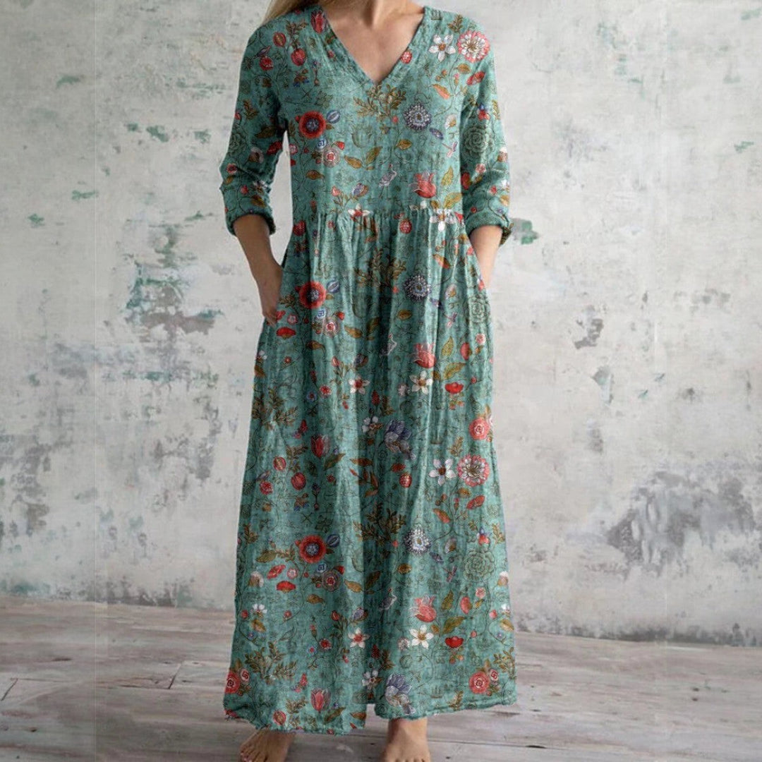 Sage green floral maxi dress featuring V-neck, long sleeves and botanical print