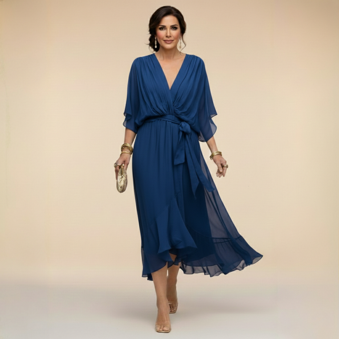 Navy blue flowy dress with draped kimono sleeves and waist tie