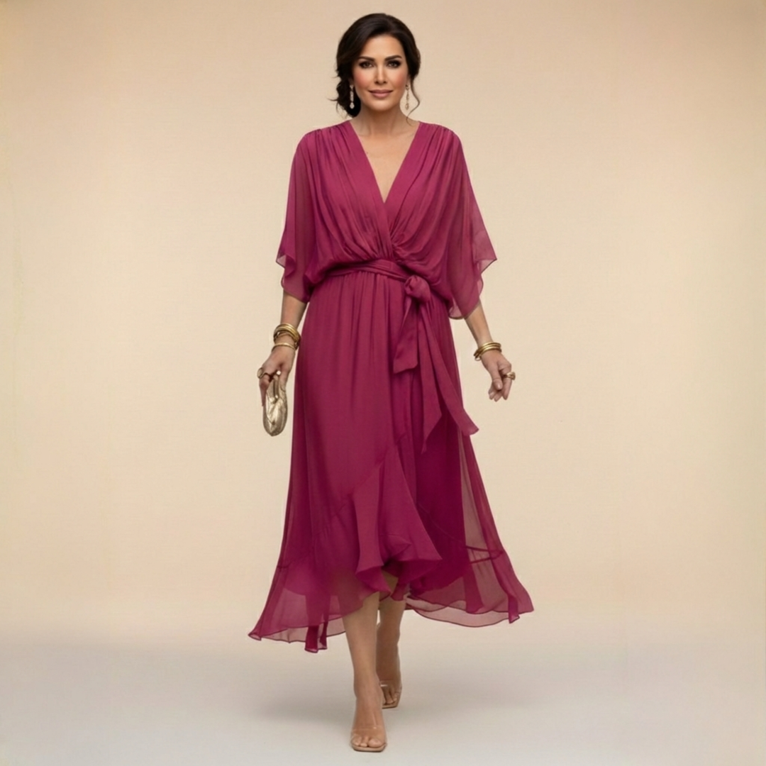 Magenta chiffon wrap dress with V-neckline and batwing sleeves