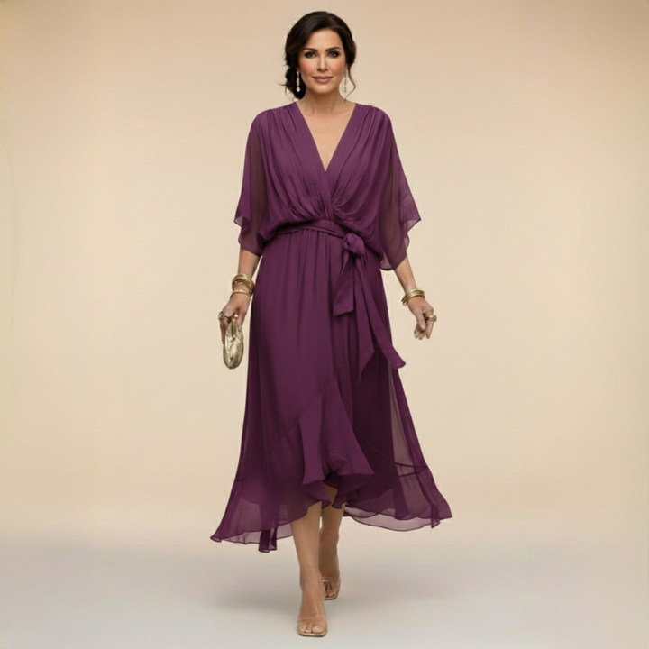 Purple flowy wrap dress with V-neckline and kimono sleeves