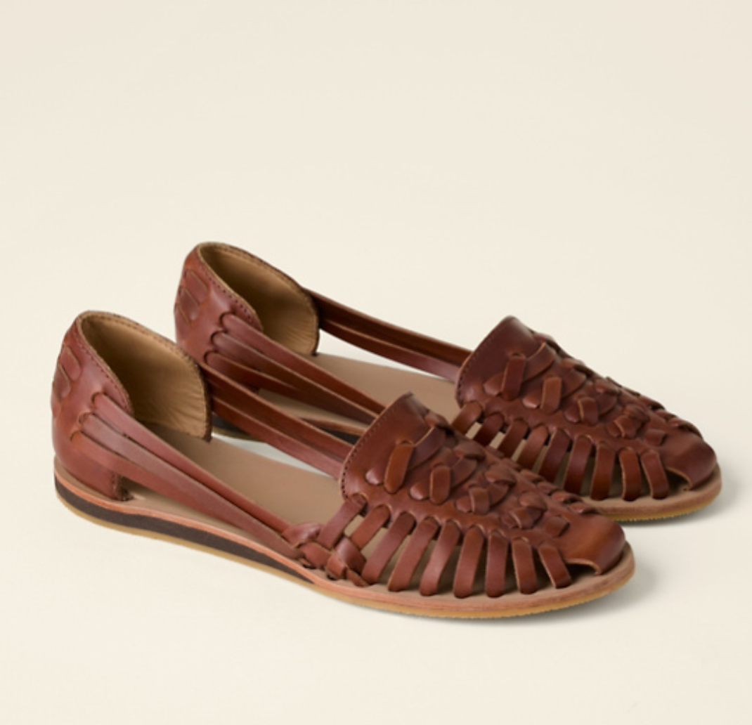 Tan brown woven leather flat sandals with braided toe detail