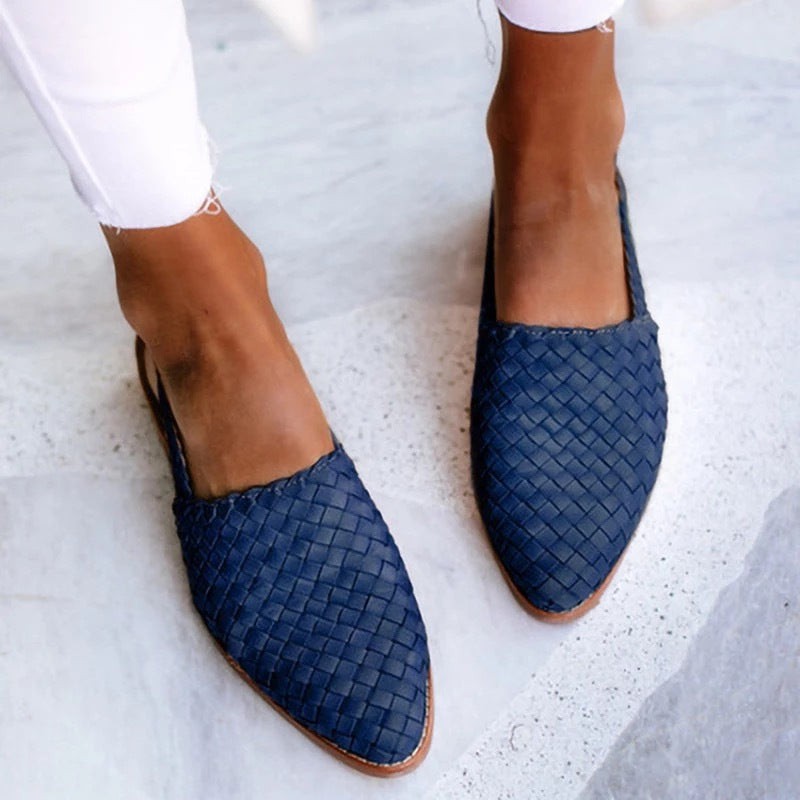 Navy blue woven leather flat sandal with pointed toe design