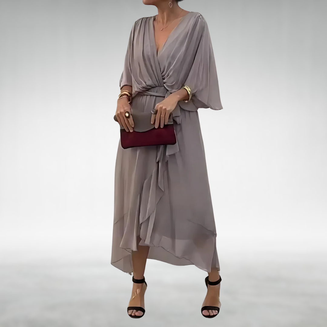 Taupe wrap maxi dress featuring draped bodice and asymmetric flowing hem