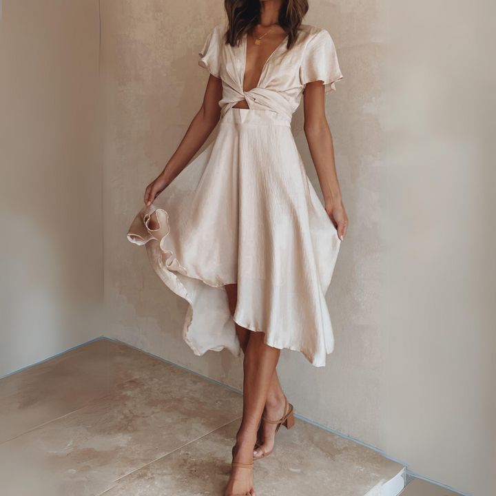 Cream satin midi dress with plunging neckline and twist-front cut-out