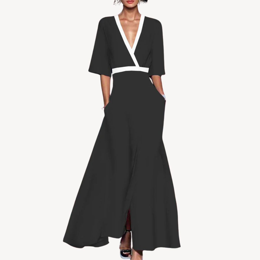 Black wrap-style maxi dress with contrasting white V-neck trim and flared sleeves
